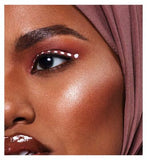 r.e.m. beauty Interstellar Highlighter Topper