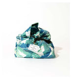 The Flat Lay Co. Open Flat Drawstring Makeup Bag in Tropical Leaves Print